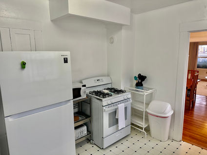 Fully stocked kitchen with housewares and appliances, large and small