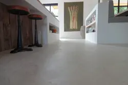 kitchen island and floor with microcement coating