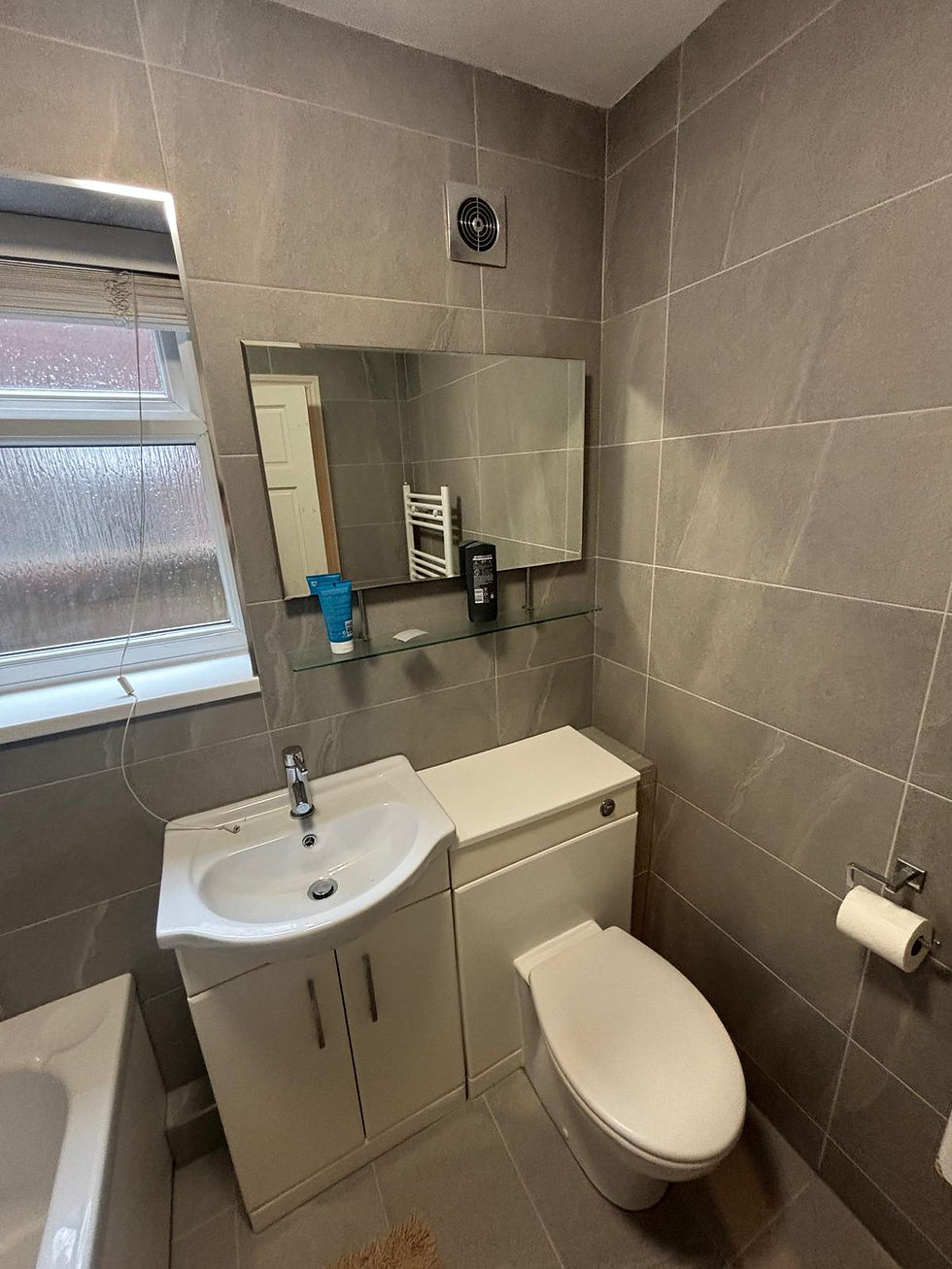 New Tiling and Existing Bathroom Re-Installed