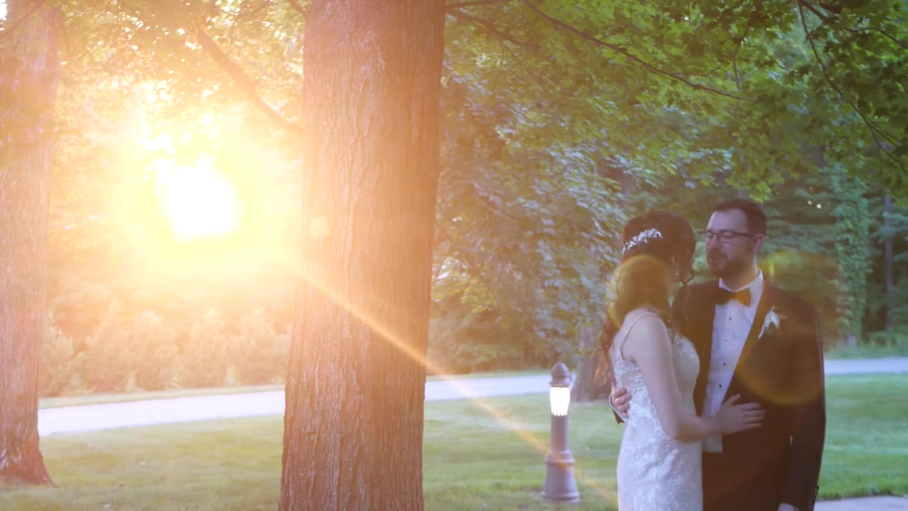 A bride and groom sharing a moment in golden evening light, captured by Pozo Media