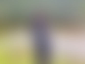 Lisa beside the water