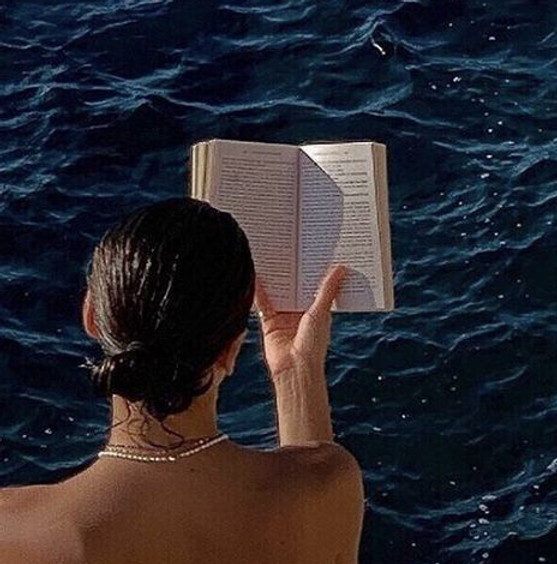 girl reading a book image