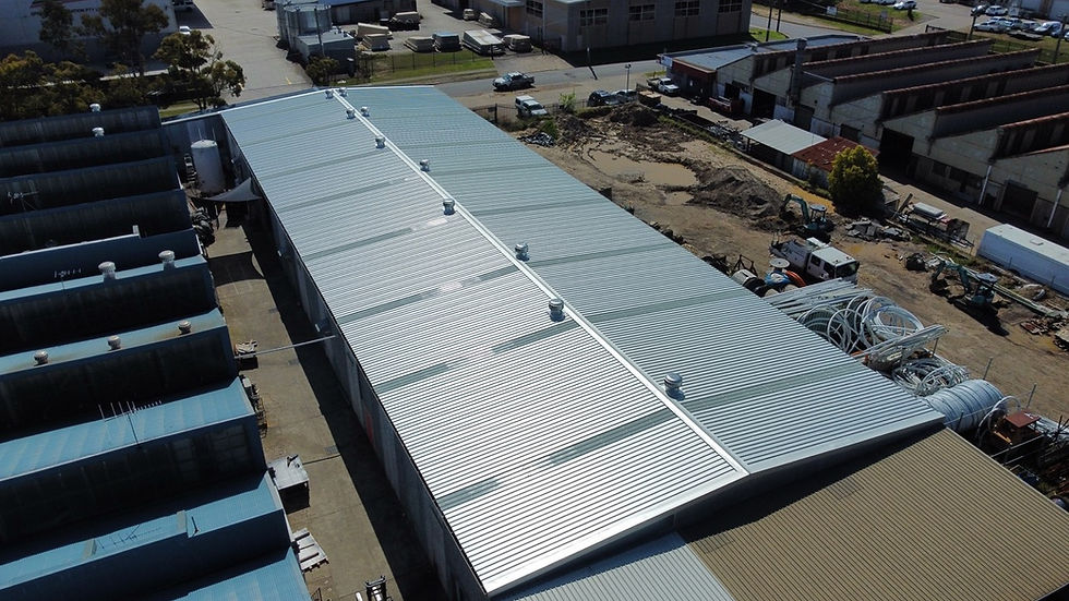 Asbestos roof removal and replacement completed for Laser Wizards