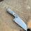 Thumbnail: The Atlas- Stainless steel with map micarta handle