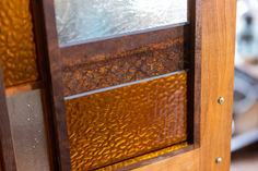 custom dining room shelf made with live edge wood and stained glass