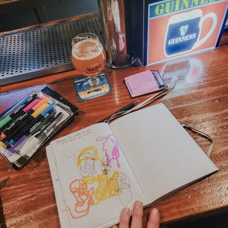 art work at a bar for a date night in asheville north carolina