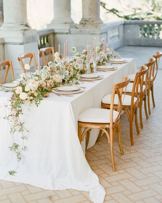 A beautiful table runner for a wedding in pink and whites