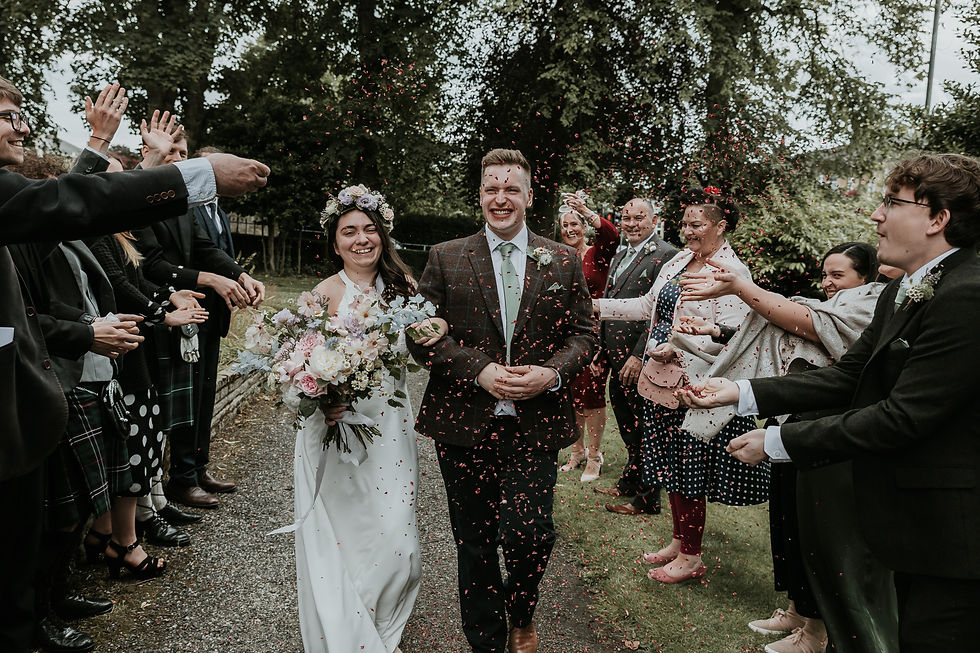 Beautiful large summer bouquet in pink and blue with couple and confetti