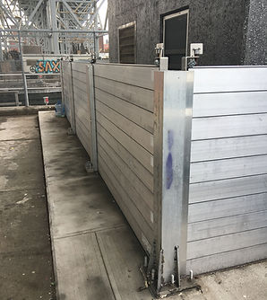 flood plank barrier system configured for complex building layout with custom orientation across multiple segments