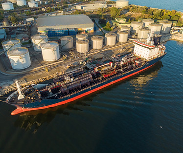aerial-view-chemical-industry-storage-tank-tanker-ship-entering-oil-terminal.jpg