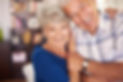 portrait-happy-senior-couple-arms.jpg