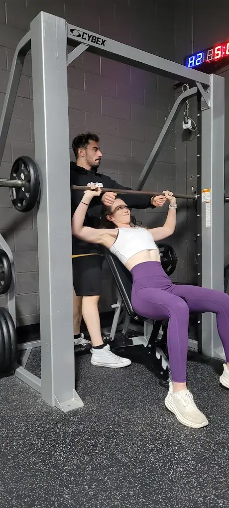 Personal trainer with client
