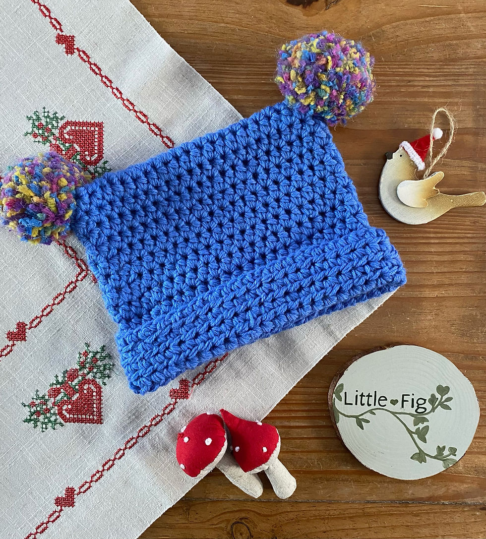 Handmade blue rainbow double bobble crochet winter children's hat by Little Fig