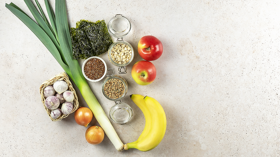 Photo of prebiotic foods like garlic, onions, leeks, bananas, apples