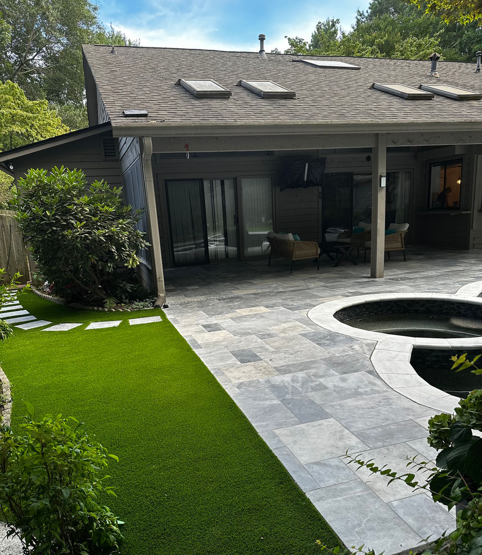 a house with a covered patio and a pool