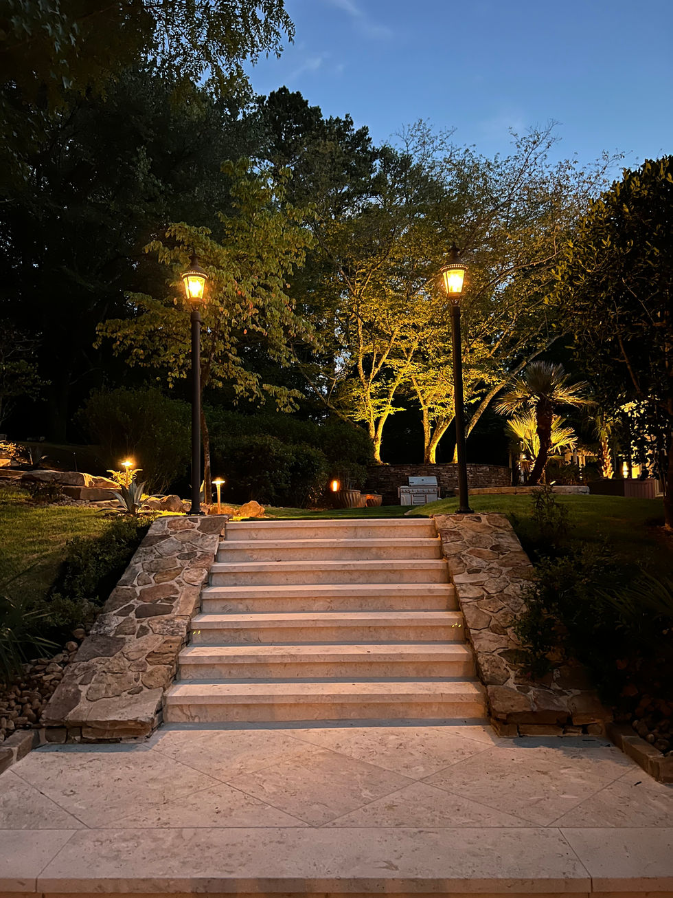 a set of stairs that are lit up at night