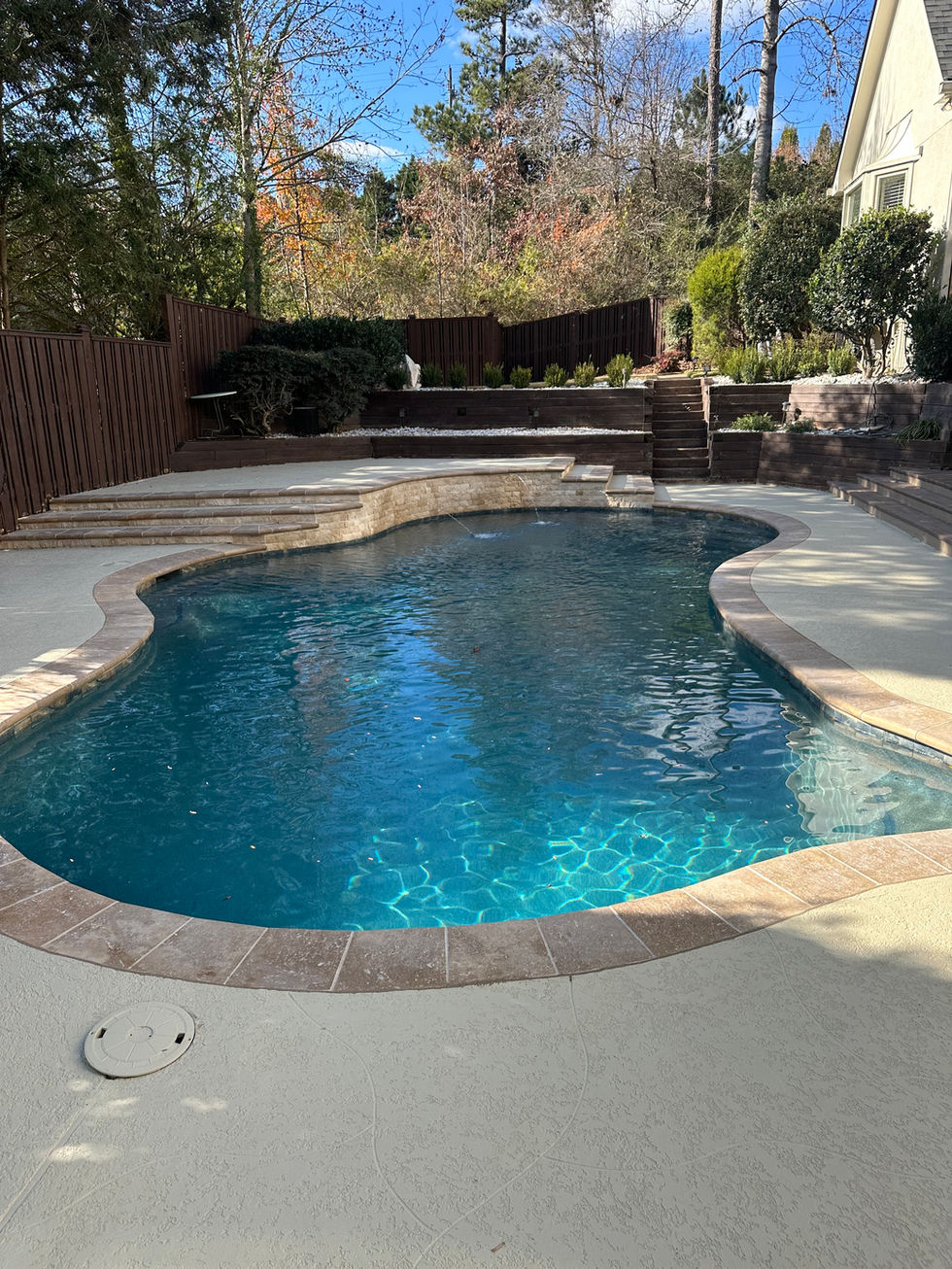 a large swimming pool with stairs leading up to it