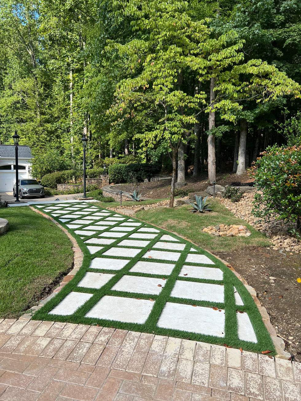 a car is parked in the driveway of a house