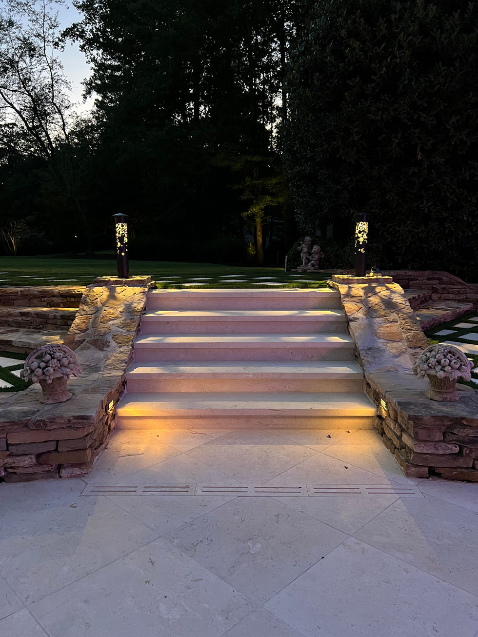 a set of stairs that are lit up at night