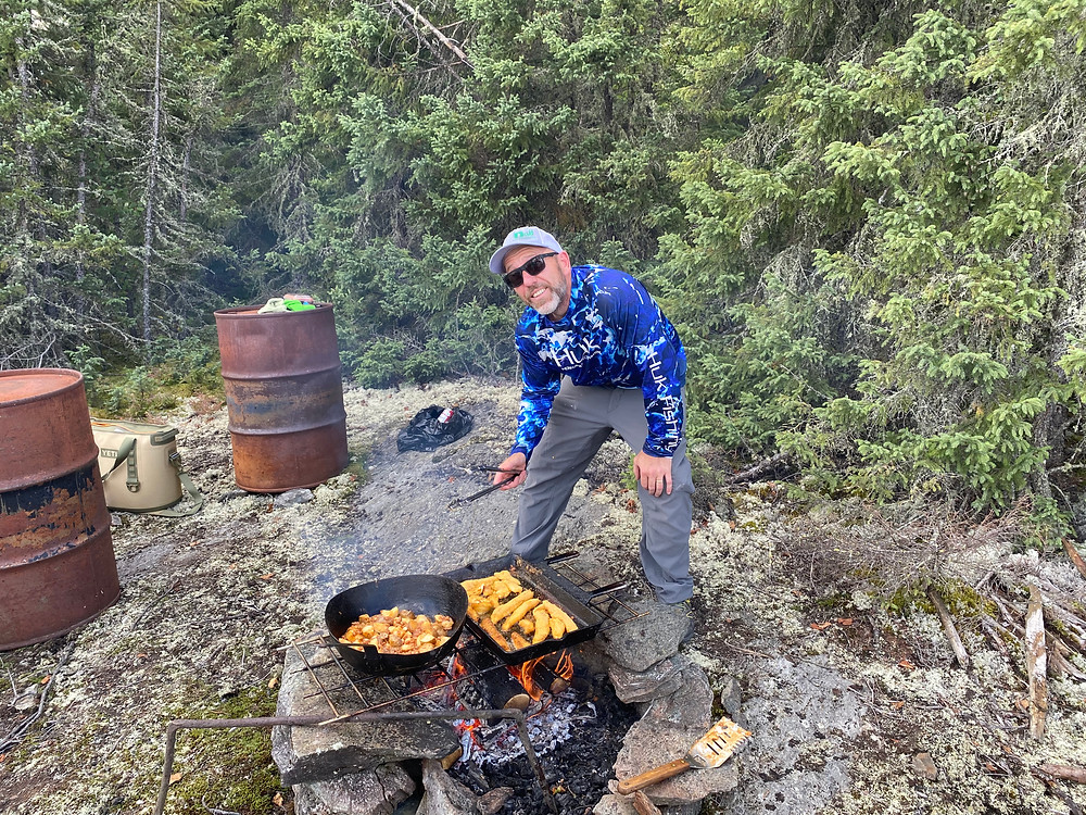 Shore lunch on a fly in fishing trip in Northern Ontario, Canada