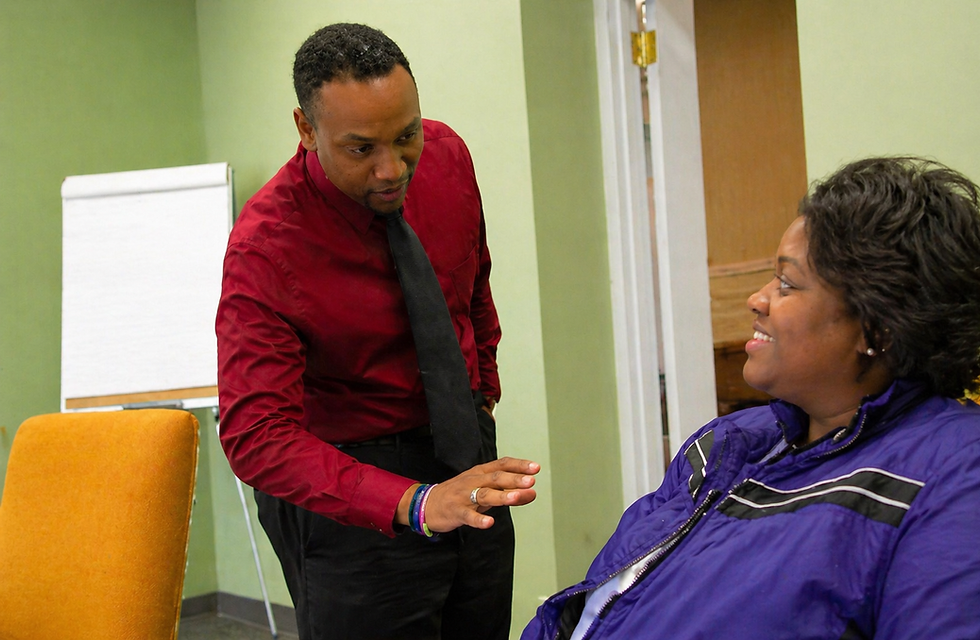 Curtis M. Singleton speaking with a community member following an act of compassion that helped a stranded elderly man in Chester, South Carolina.							