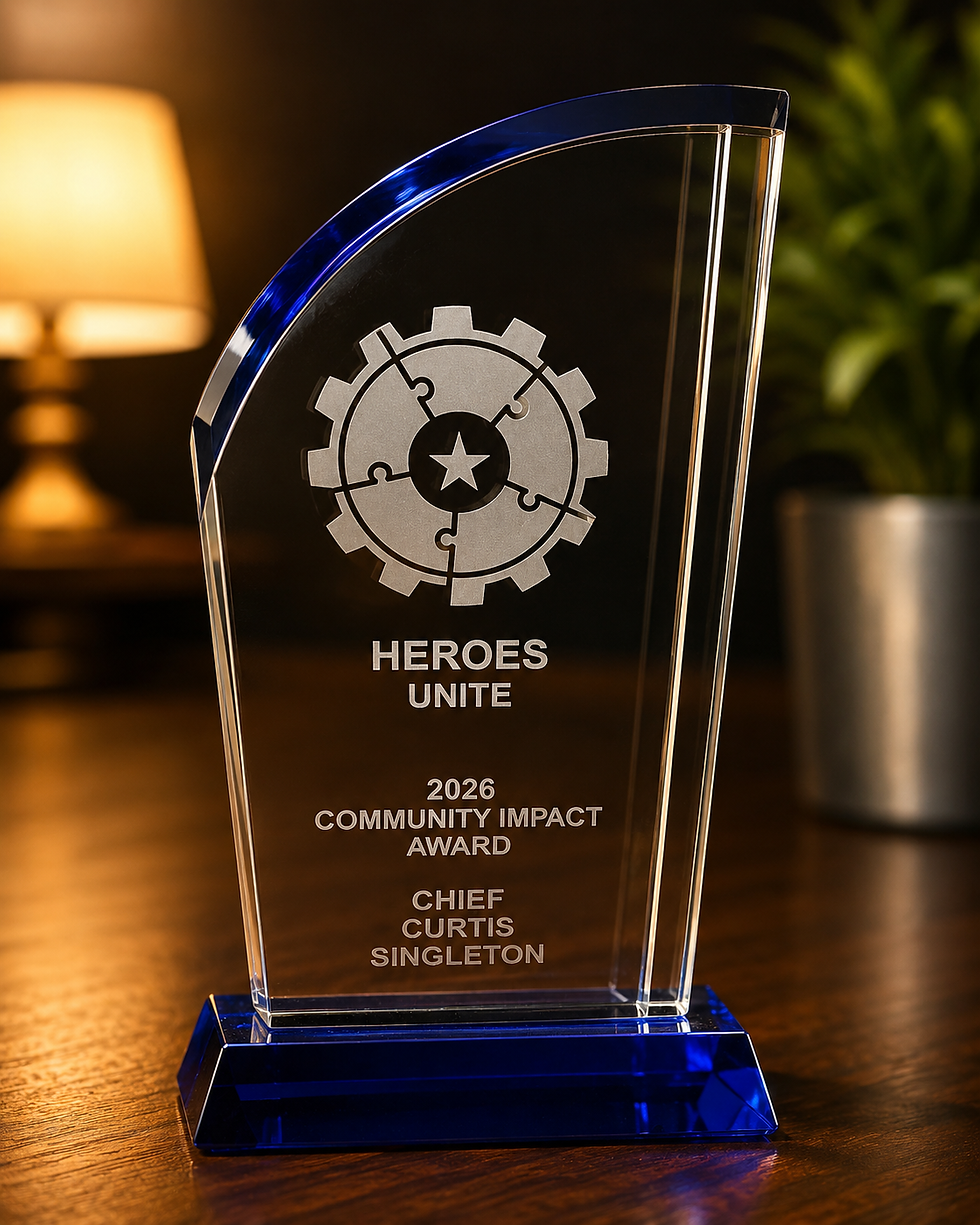 The 2026 Heroes Unite Community Impact Award was presented to Chief Curtis Singleton for service, leadership, and community impact.