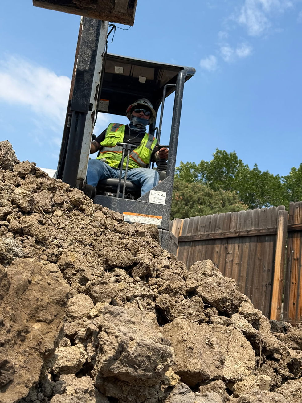 Construction crew on a machine