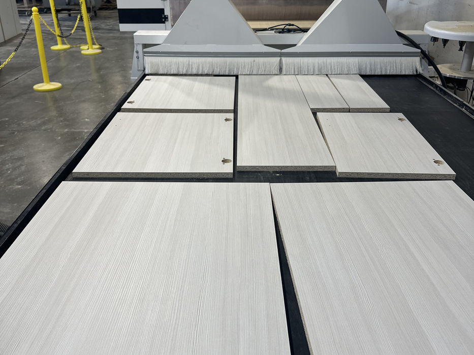 Robotic arm processing wood panels