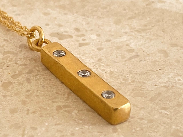 Thumbnail: Gold bar zirconia pendant