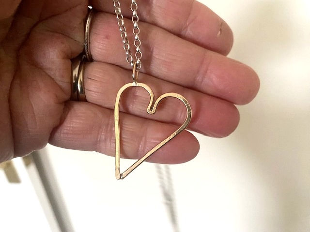 Thumbnail: Gold heart on silver chain