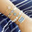 Miniaturbild: Atemberaubendes weißes Armband mit bösem Blick, vergoldetes Edelstahl-Schmuckset