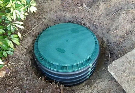 Placing-Septic-Cover-on-Riser-1920w_edited.jpg