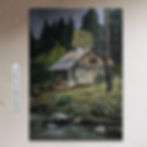 Rustic cabin beside a stream in a forested setting, surrounded by trees and greenery. The artwork features textured brushstrokes. Text: KHEDERPAINTINGS.