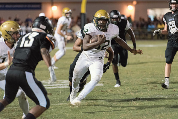 Quarterback running the ball