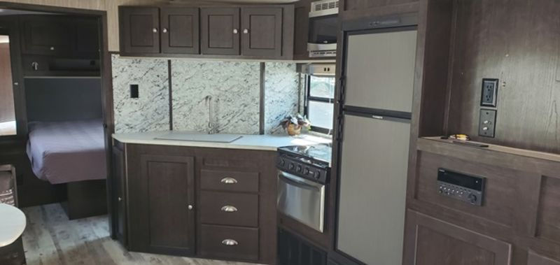 2019 Heartland Sundance 262RB Travel Trailer | Family RV | Family RV Salem, Oregon | salem oregon rv dealer | salem rv | camping in salem, oregon | used travel trailer for sale oregon | used campers near me | used motorhome for sale | camping in oregon | travel trailers for sale oregon | rv dealer near me | rv dealer in salem | best rv dealers salem, or | oregon rv dealer | best oregon rv dealer | top oregon rv dealer | salem rv dealer | salem, or rv dealer | keystone dealer | fleetwood dealer | jayco dealer | thor dealer | heartland dealer | coachmen dealer | winnebago dealer | forest river dealer | holiday rambler dealer | tiffin dealer | monaco dealer | northwood dealer | lance dealer | outdoors dealer | dutchmen dealer | starcraft dealer | camper van | class a | used motorhomes | class C | rv dealership | older travel trailer | older Class A | older Class C | cheap trailers in salem | cheap rvs oregon | trailer sales in salem, oregon | rv sales near me | used trailer sales | salem oregon motorhomes for sale | salem oregon travel trailers for sale | heartland sundance | heartland sundance for sale in salem oregon | used class a in salem, or | used class c in salem, or | used fifth wheel in salem | fifth wheel for sale in salem |  fifth wheel trailer near me | salem rv dealer | salem rv repair | salem rv service center | salem rv parts | salem mobile service | salem travel trailers for sale | toy hauler for sale in salem oregon | toy hauler trailer for sale in oregon | salem travel trailer toy hauler | family rv toy hauler