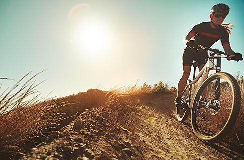 Nature, cycling and mountain bike with fitness, training and extreme sport at morning on d