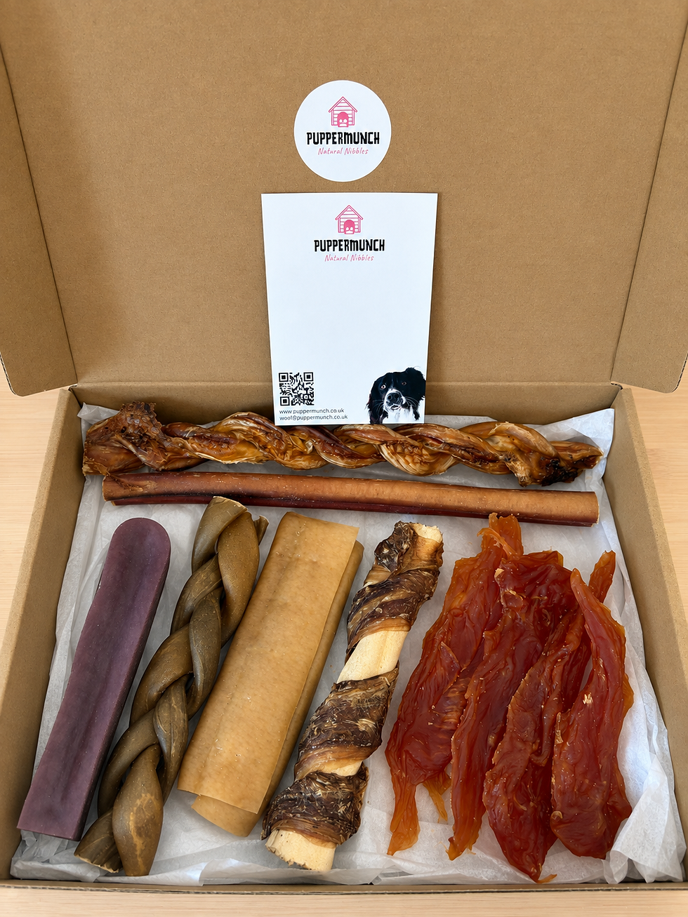 Chew It! natural dog treat box with an assortment of longer-lasting chews