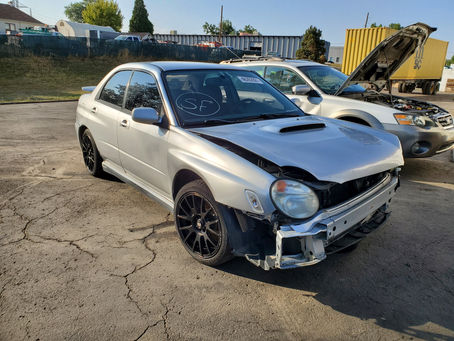2002 Subaru WRX sedan 2.0L 161k M/T 5 speed Silver
