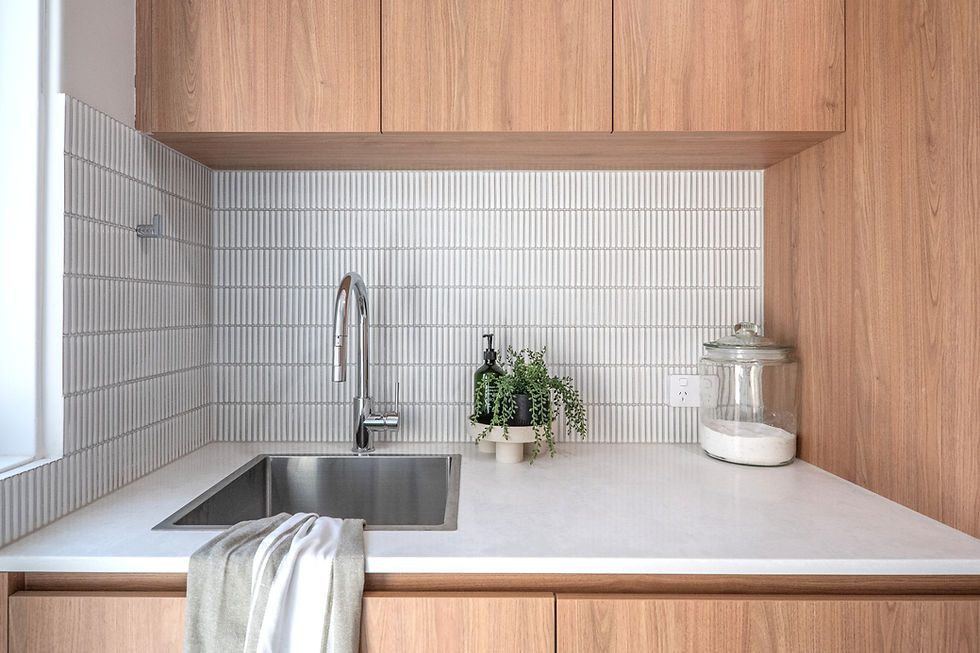 Laundry room with white benchtop