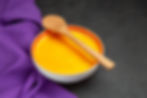 front-view-simple-pumpkin-soup-with-spoon-grey-table.jpg