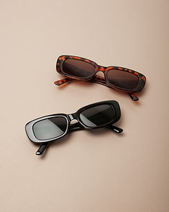 Avanglion oval sunglasses in black, brown with black, brown lenses. Meltrade Avanglion Ava