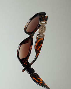 Avanglion oval sunglasses in brown with smoke brown lenses. Meltrade Avanglion Ava You and