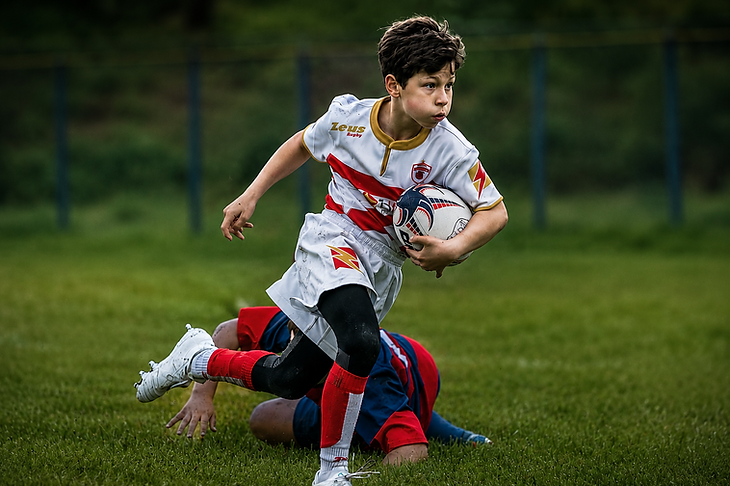 Mathias Ciobanu running with rugby ball