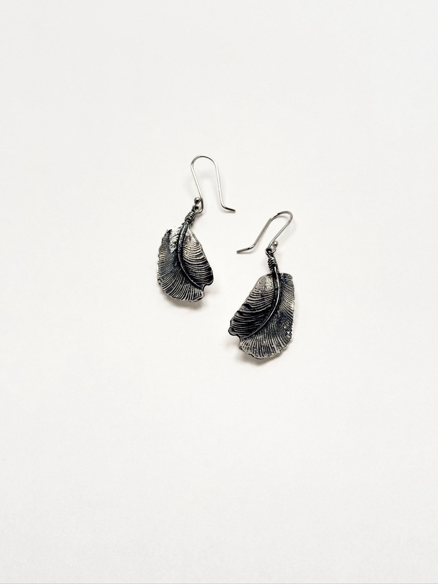 Aretes de pluma