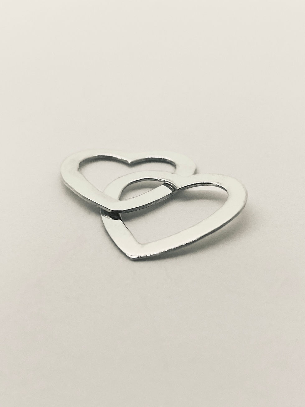 Miniatura: Cadena con dije de corazones entrelazados