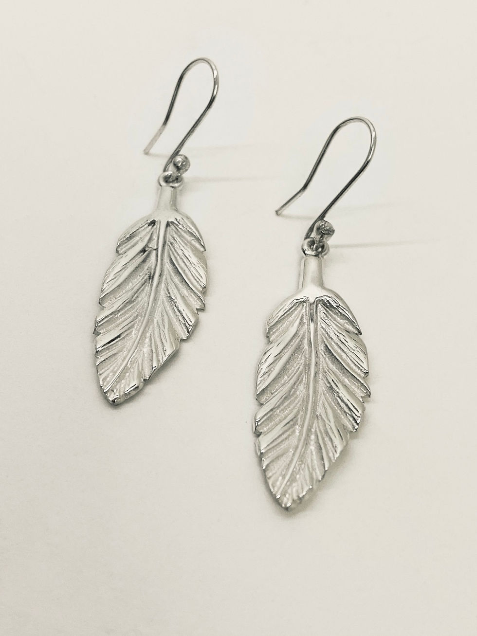Miniatura: Juego de pluma en plata