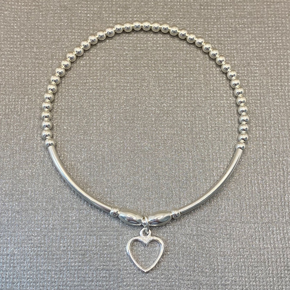 Thumbnail: Sterling Silver Noodle Bead Bracelet With Open Heart Charms