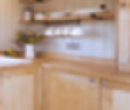 Rustic kitchen corner inside a bespoke shepherd’s hut
