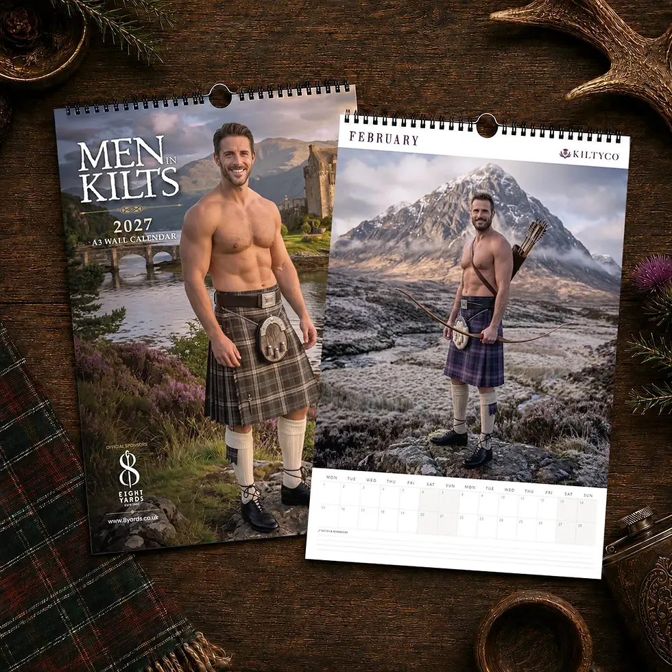 Open Men in Kilts Calendar 2027 A3 wall calendar showing February beside the front cover on a wooden table