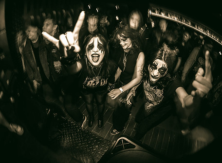 a group of people with painted faces and